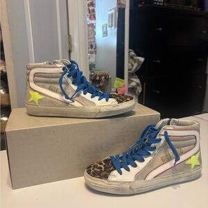Golden Goose High-Tops with Blue and Yellow Accents